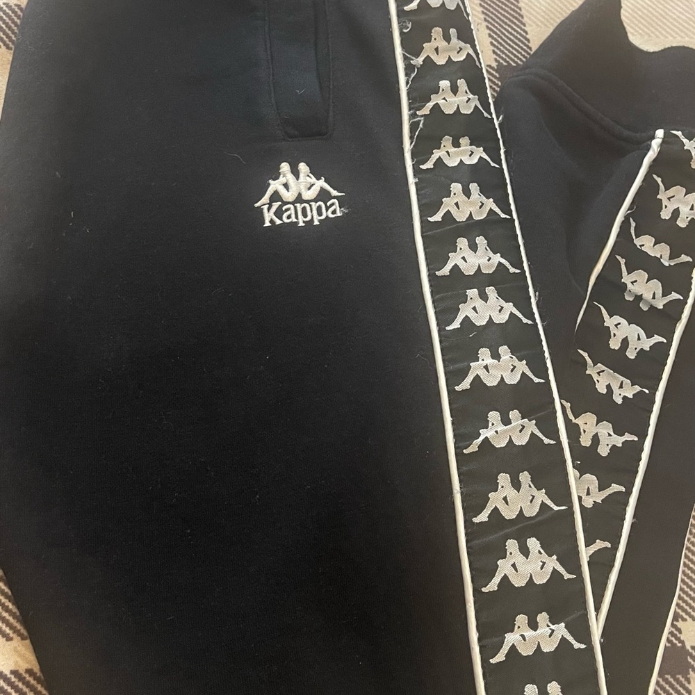 Black Kappa sweat pants.